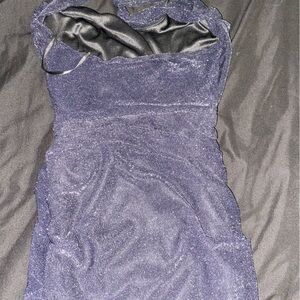 Shimmery black tight holter top dress. Super cute never worn still has tags